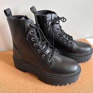 Never worn combat boots !